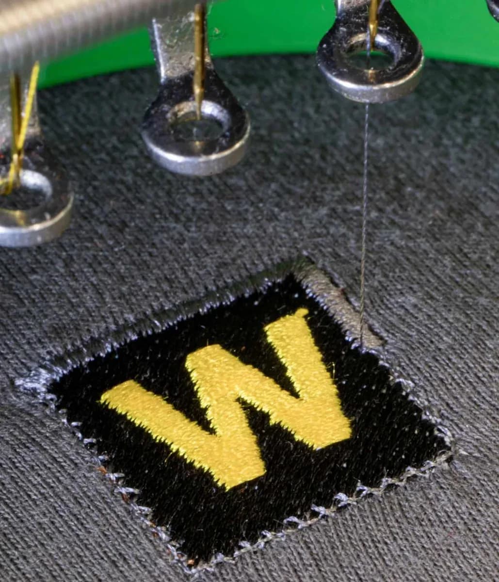 Industrial embroidery machine stitching company logo — embroidery Farnborough